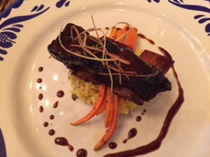 Braised bison short ribs with garlic roasted baby carrots and saffron risotto finished with a root beer demi glaze from Blue Canyon Kitchen & Tavern. Blue Canyon has locations in Missoula and Kalispell next to the Hilton Garden Inn.