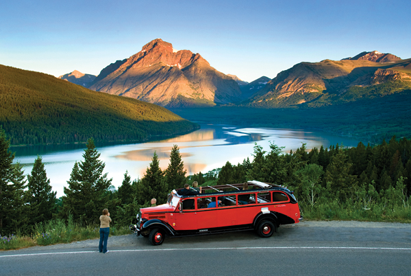 A red bus in Glacier National Park. 