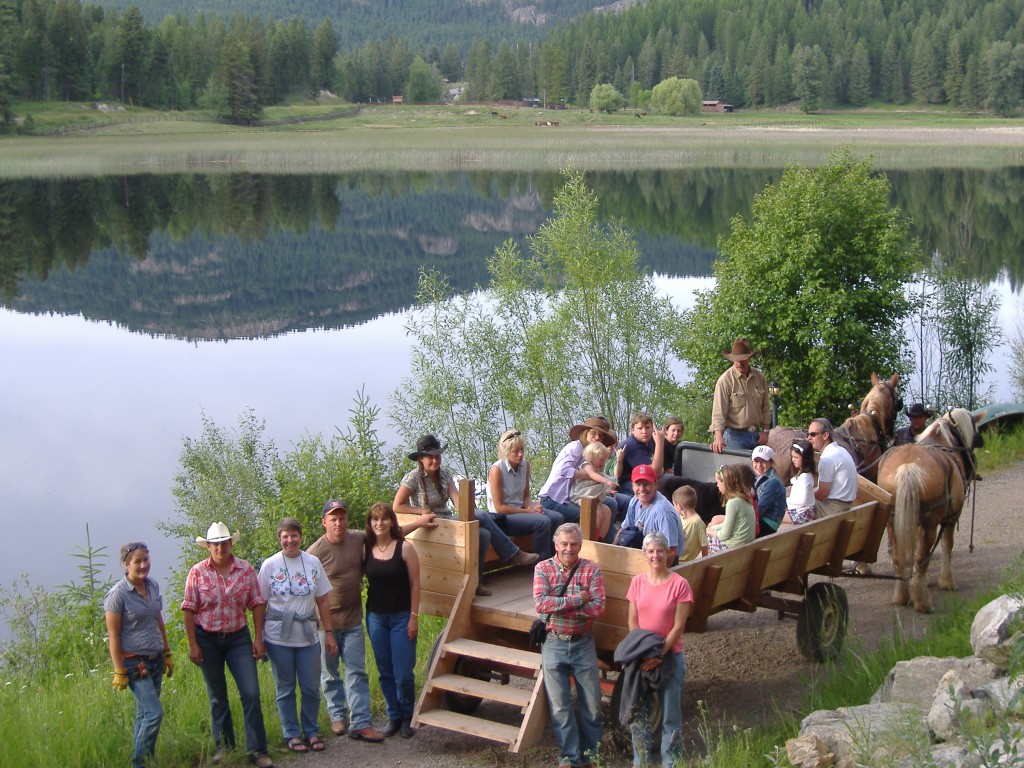 A group enjoys a horse-drawn wagon ride at Bar W Guest Ranch. 