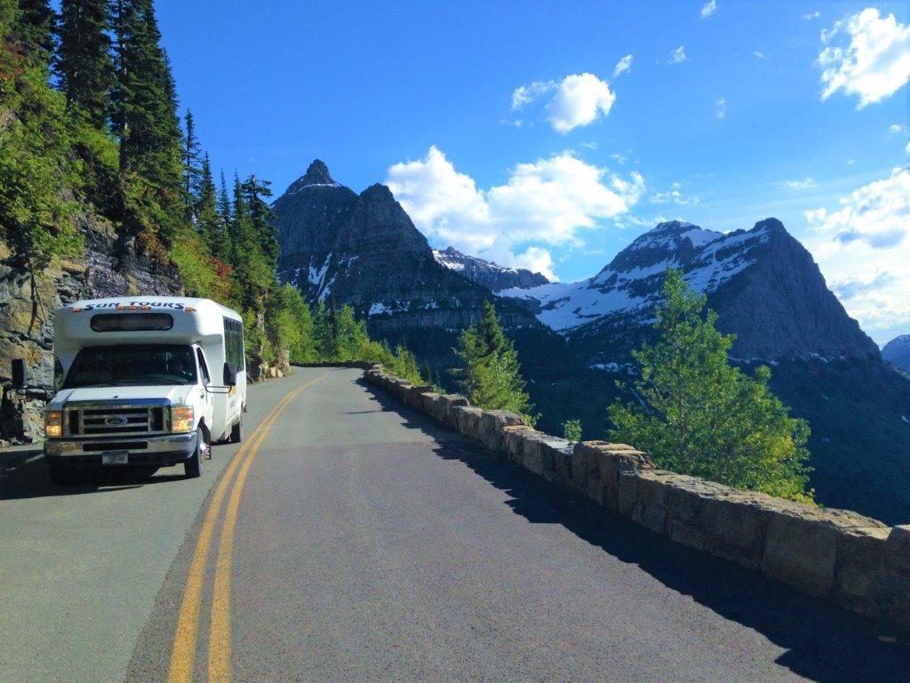 A Sun Tour cruises along the Going-to-the-Sun Road. 